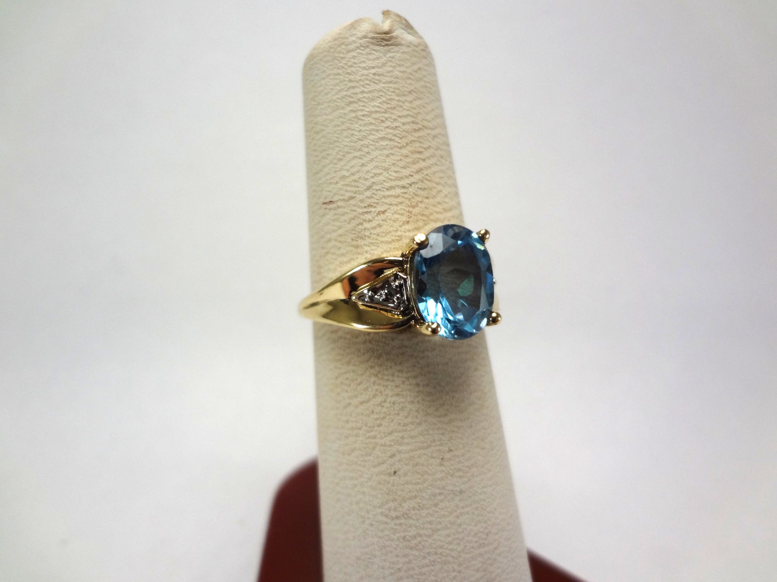 10K SOLID GOLD – SWISS BLUE TOPAZ AND DIAMOND RING – 3.10 GRAMS – SIZE 7.0 – F95