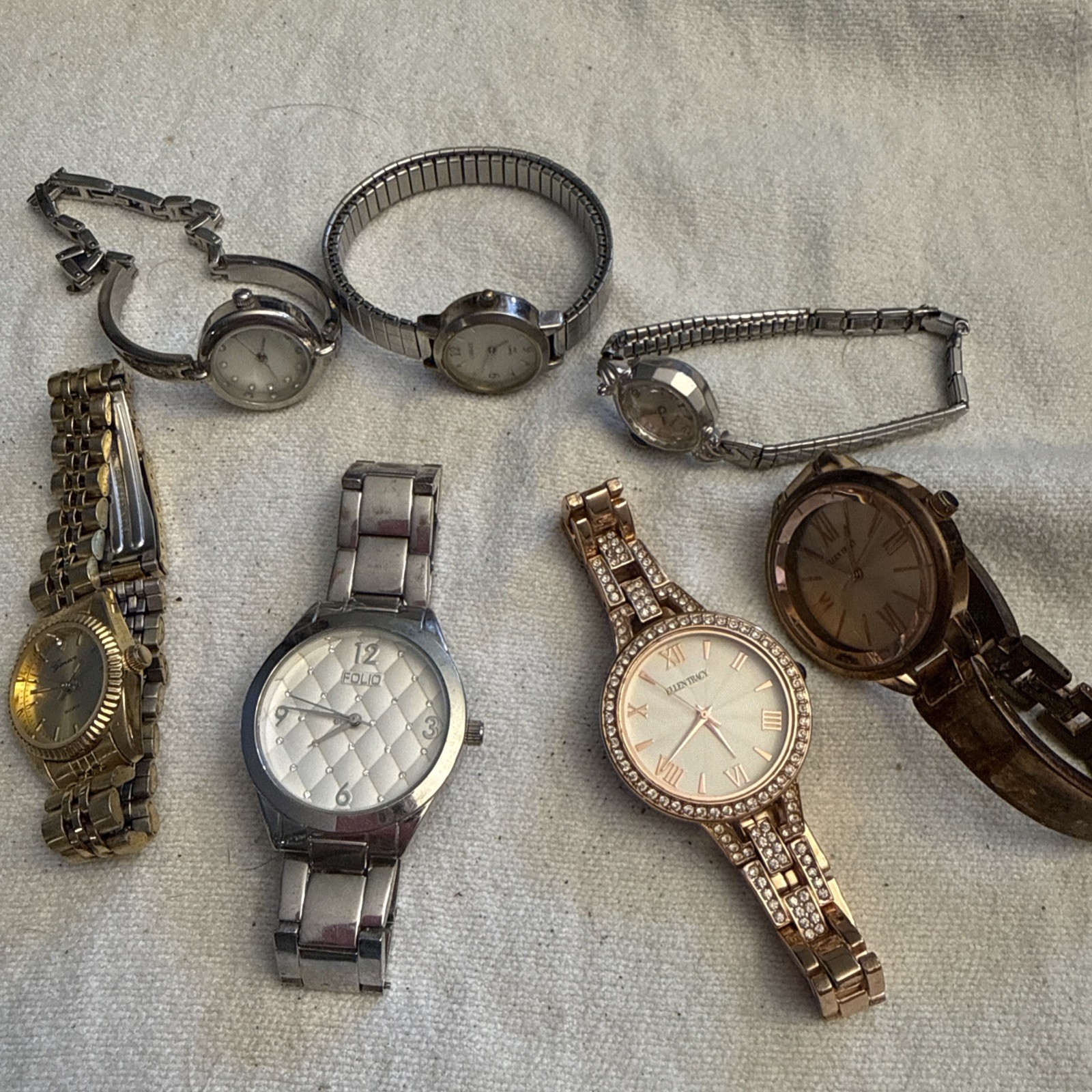 Lot of 7- Assorted Women’s Watches (Folio,Ellen Tracy,Carrige,Geneve)