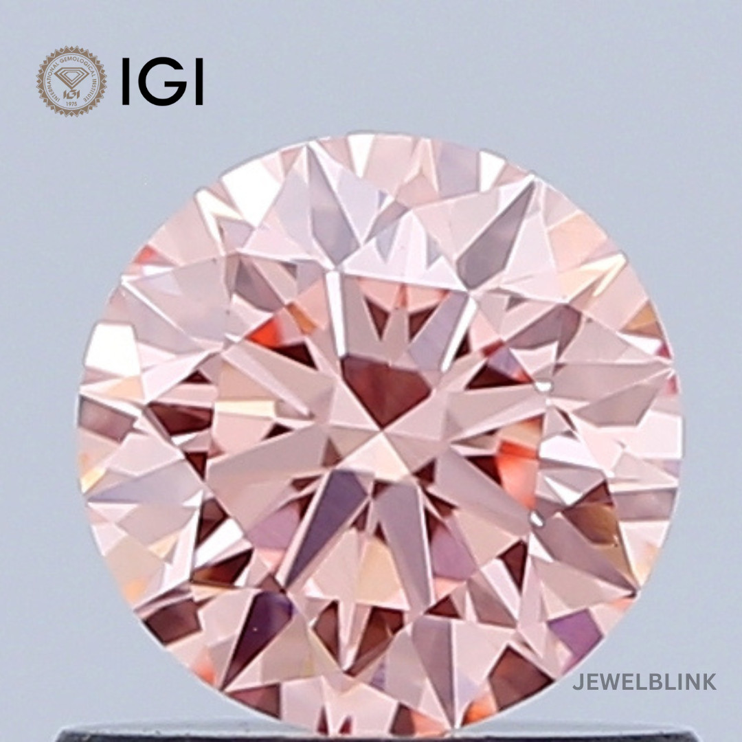 IGI Certified 0.66 CT VS1 Fancy Vivid Orangy Pink Round Cut Lab Grown Diamond