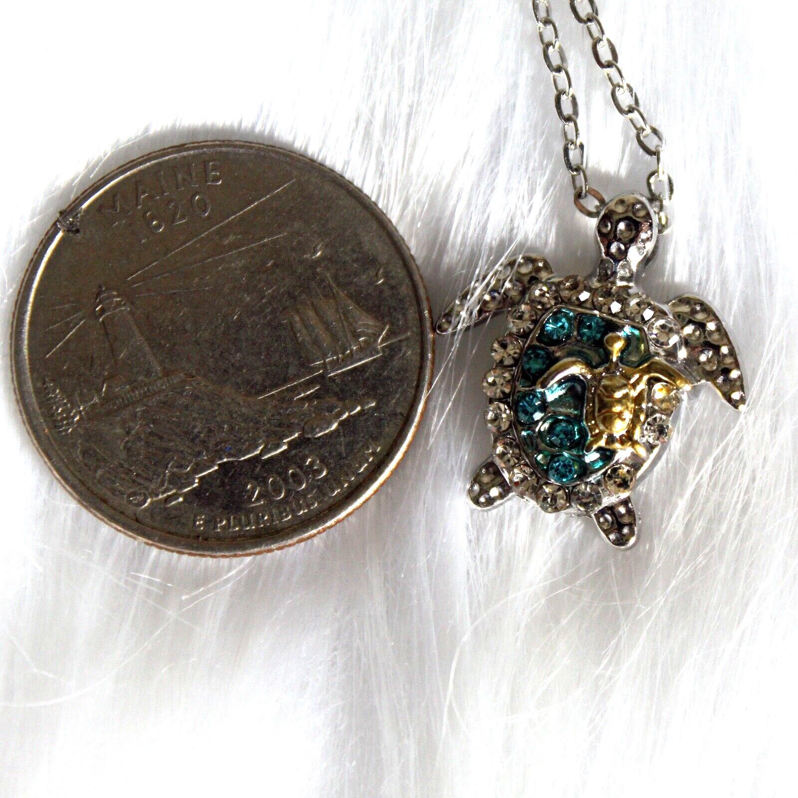 Silver Sea Turtle with Blue Stones and a Gold on an 18″ Silver Chain Mom Baby