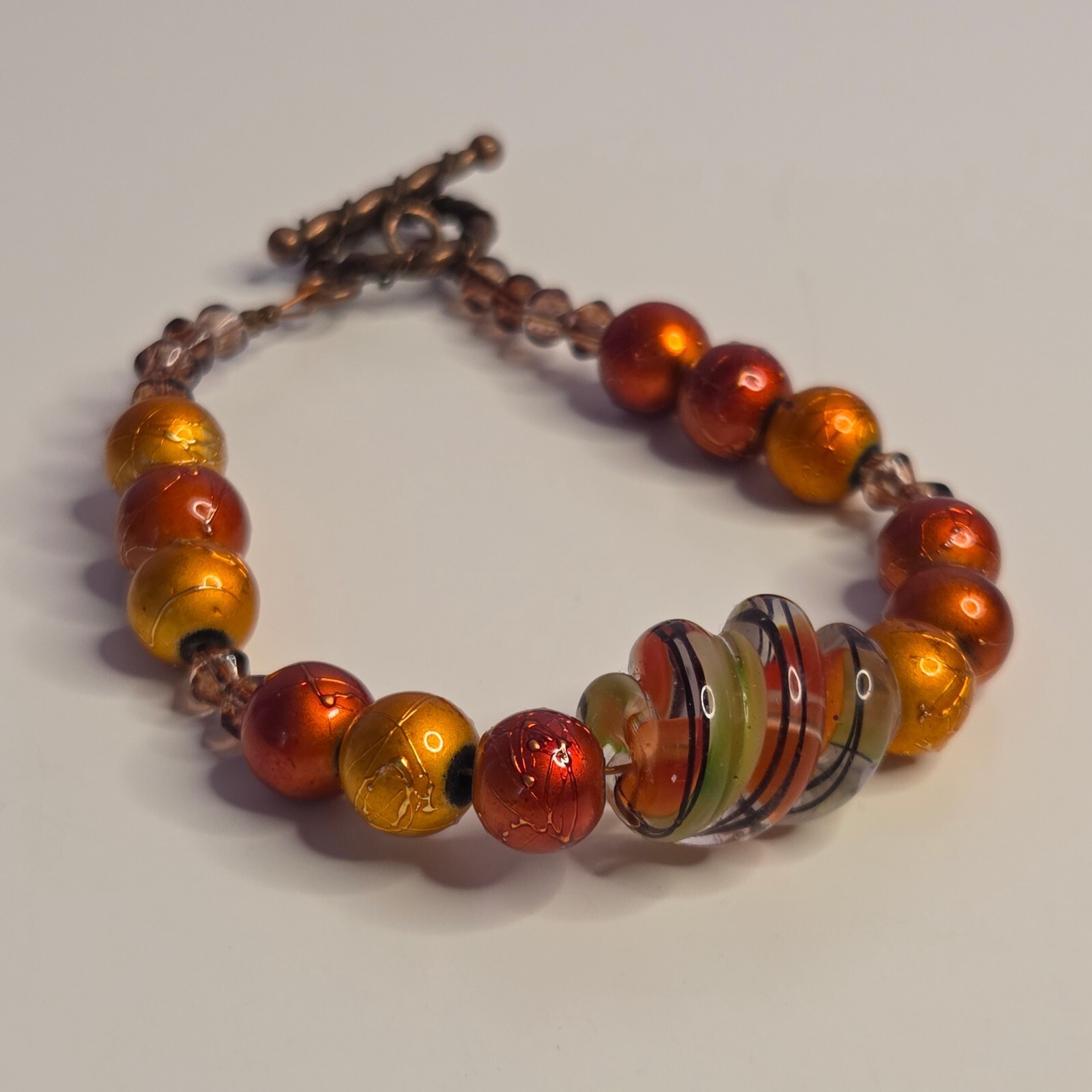 Artsy Y2K Boho Red & Orange Bronze Tone Artisan Beaded Bracelet w/ Glass Bead