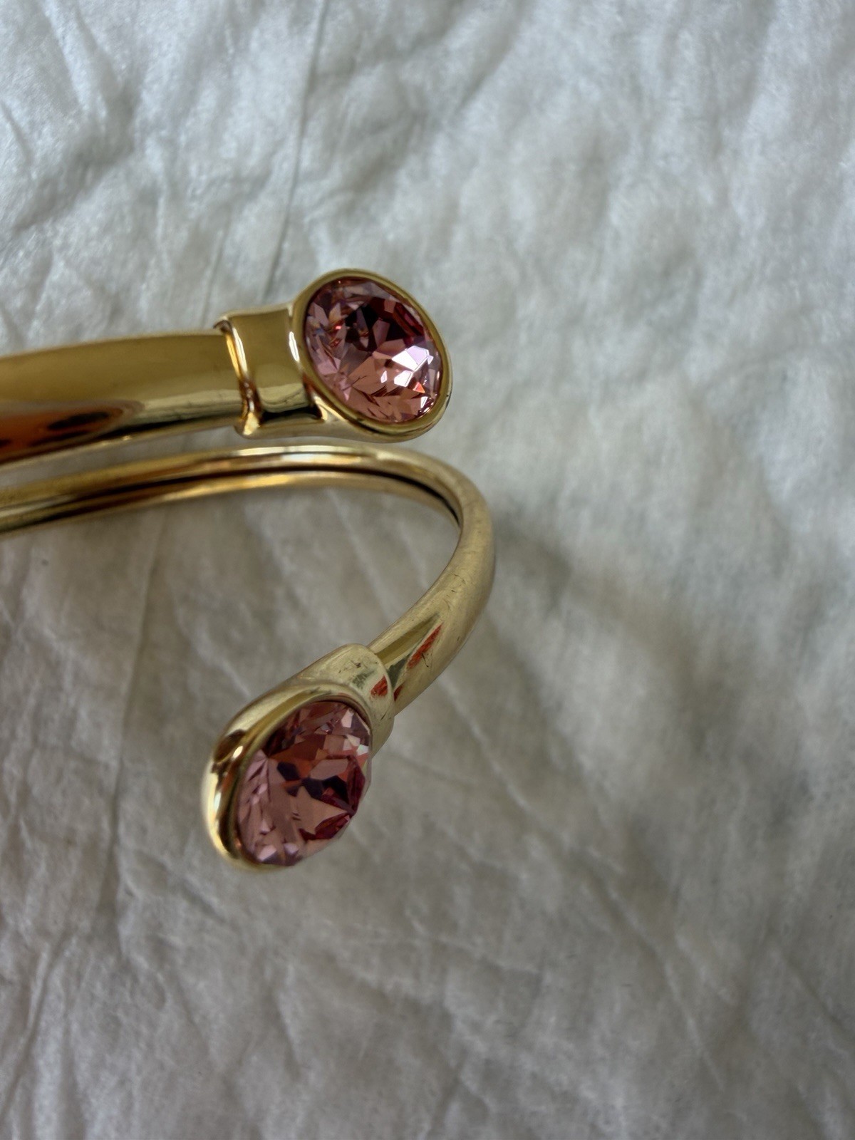 Goldtone Open-Ended Bangle Bracelet with Pink Gemstone Accents