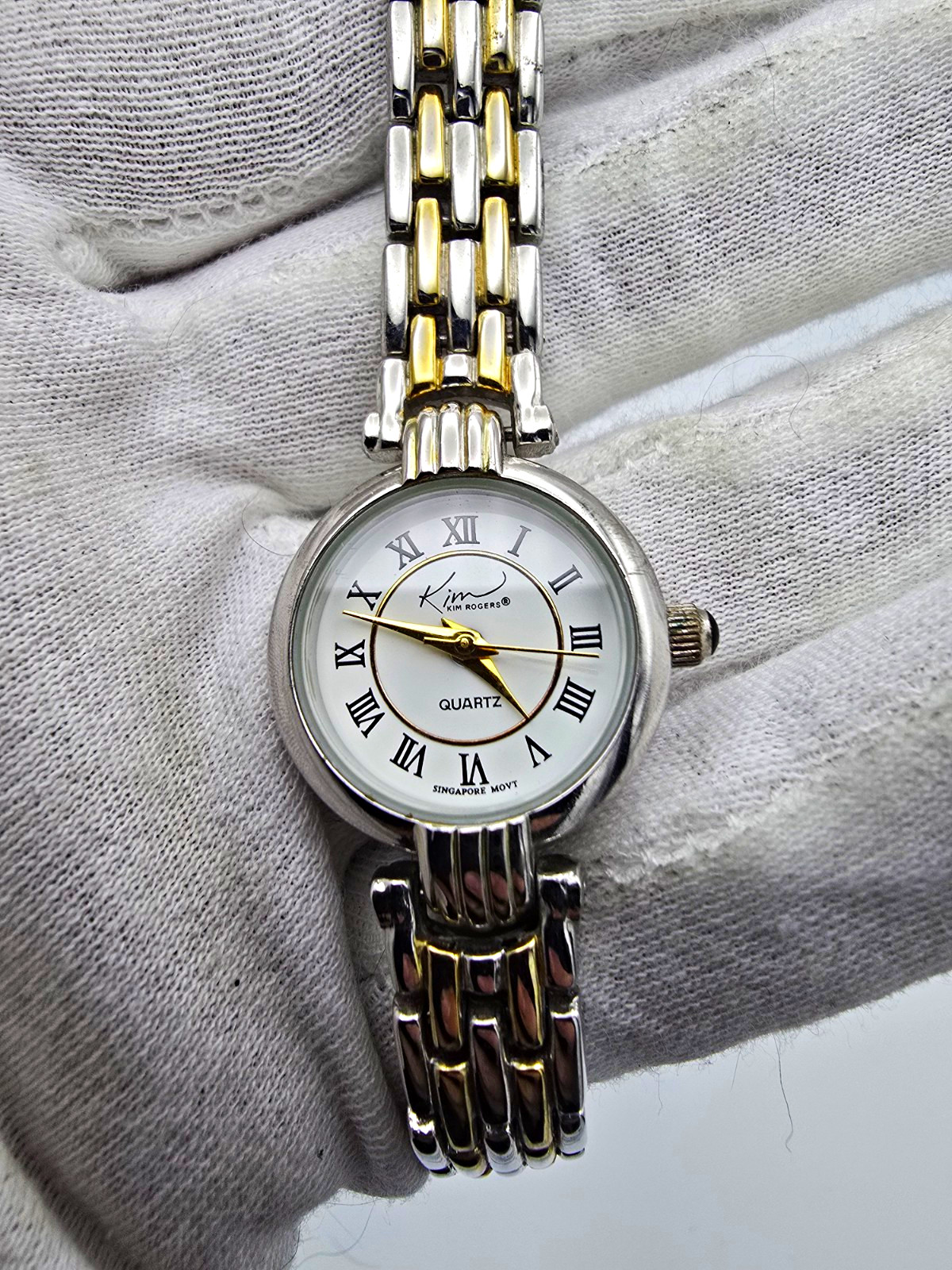 Kim Rogers Women’s Quartz Analog Wristwatch Two-Tone Bracelet White Roman Dial