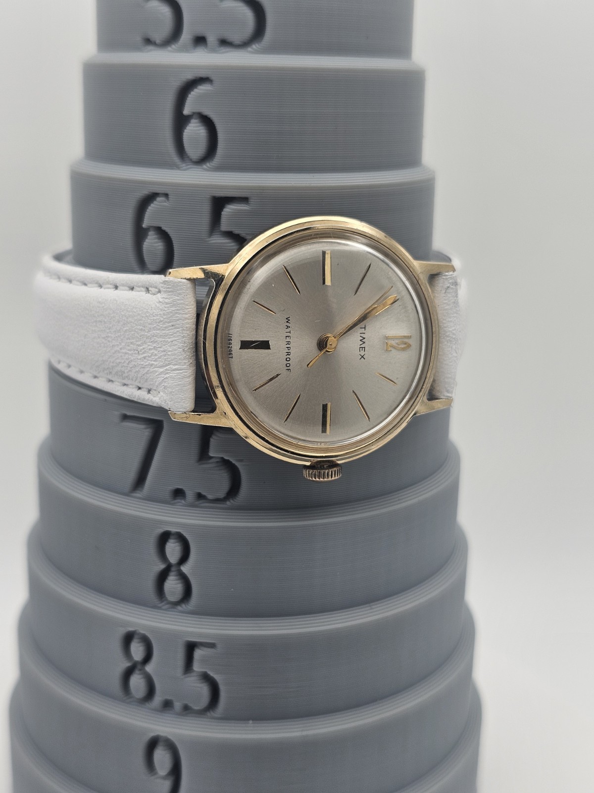 Timex Vintage Manual Wind Analog 29.5mm Gold SS Case Silver Dial White Strap