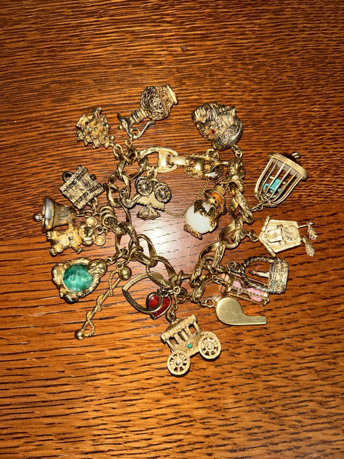 Gold Monet Charm Bracelet Good Condition- 18 Charms Several Articulated