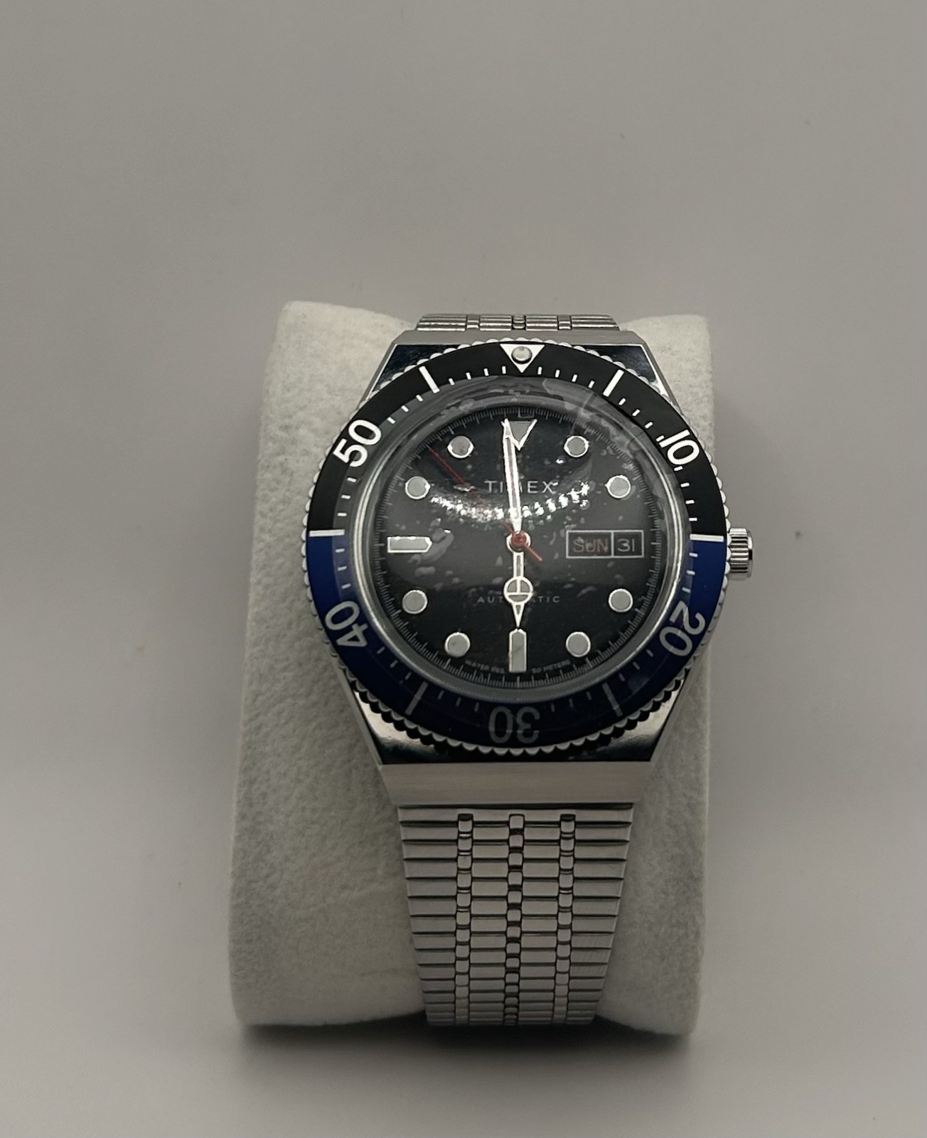 Timex M79 Men’s Batman Bezel Silver Stainless Steel Woven Automatic 40mm Watch