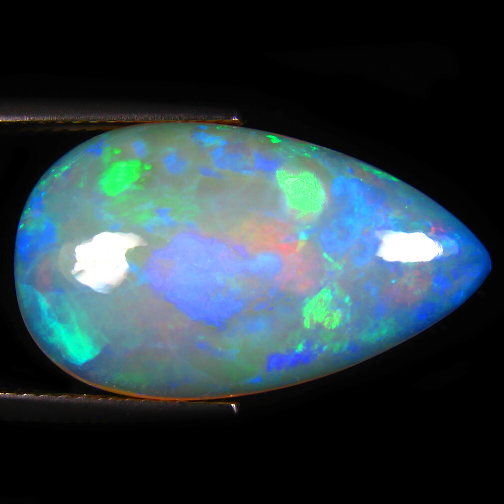 10.27 ct Remarkable Pear Cabochon (23 x 14 mm) Flashing Multicolor Rainbow Opal