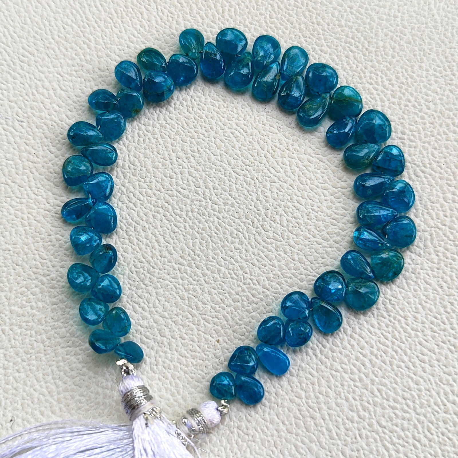 Madagascar Neon Blue Apatite Smooth Pear Shape Beads 6×4 to 8x6mm 7.5″ Strand