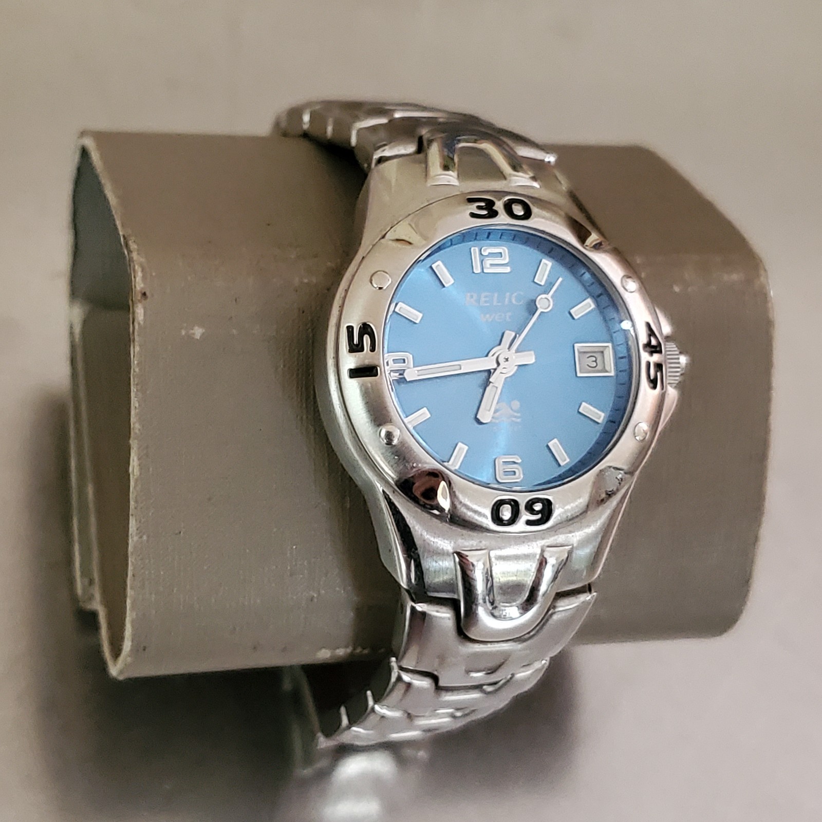RELIC Wet Watch Women’s Analog Date Blue Dial Rotating Bezel Stainless 6 in 31mm