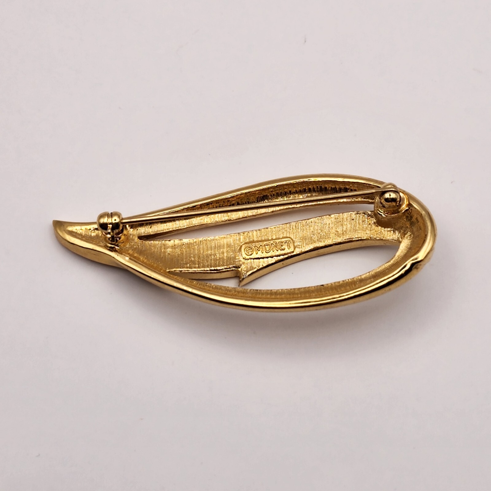 Monet Gold And White Abstract Brooch Metal and Enamel Signed