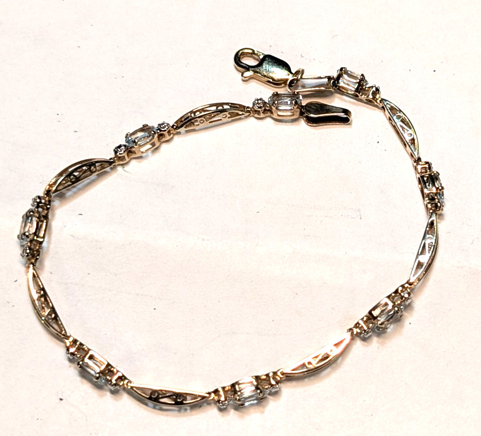 10K YELLOW GOLD AQUAMARINE TENNIS BRACELET 7 INCHES LONG & 3.20 GRAMS