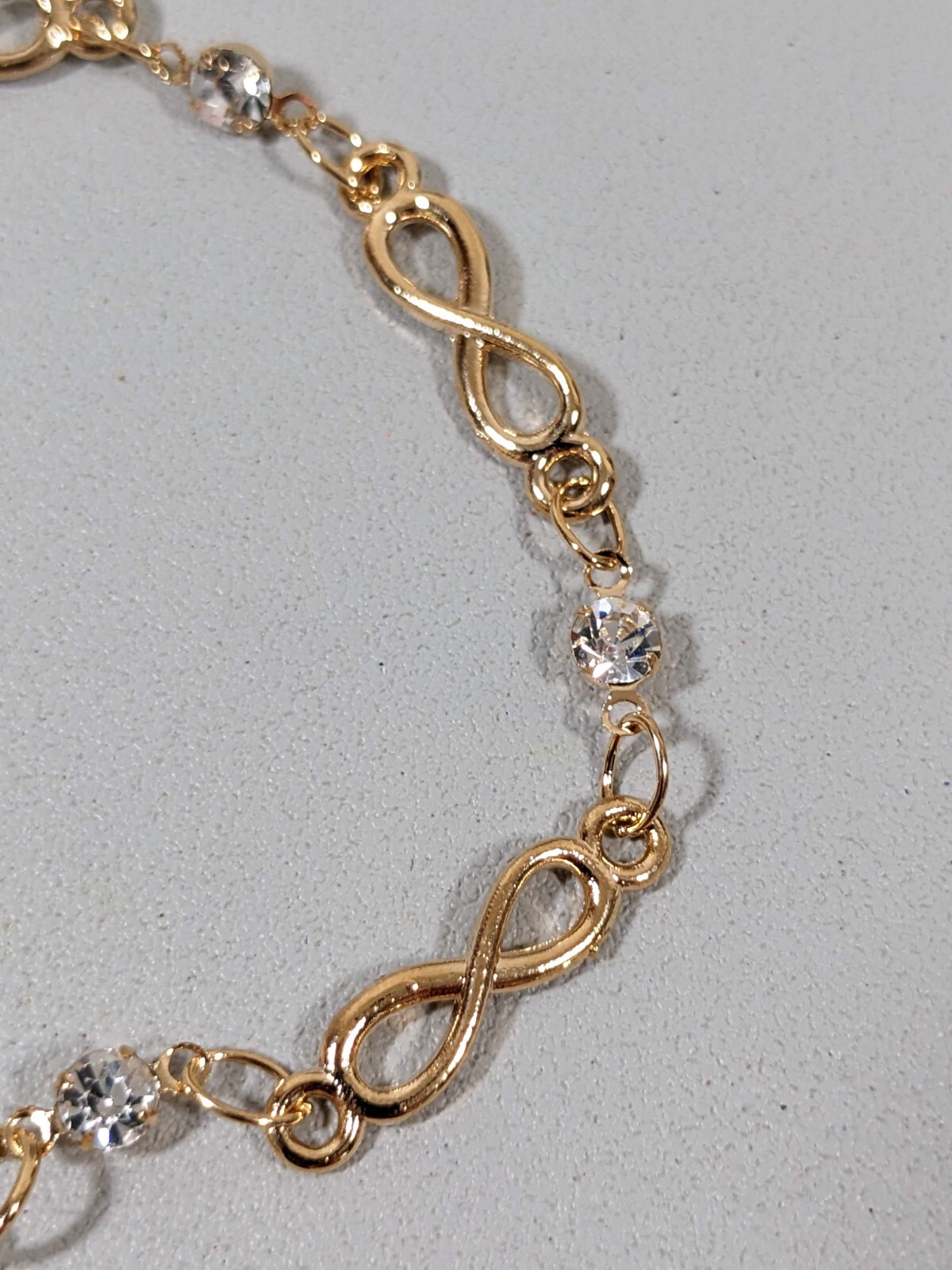 Gold Tone Infinity Clear Crystal Tennis Bracelet 10 inches