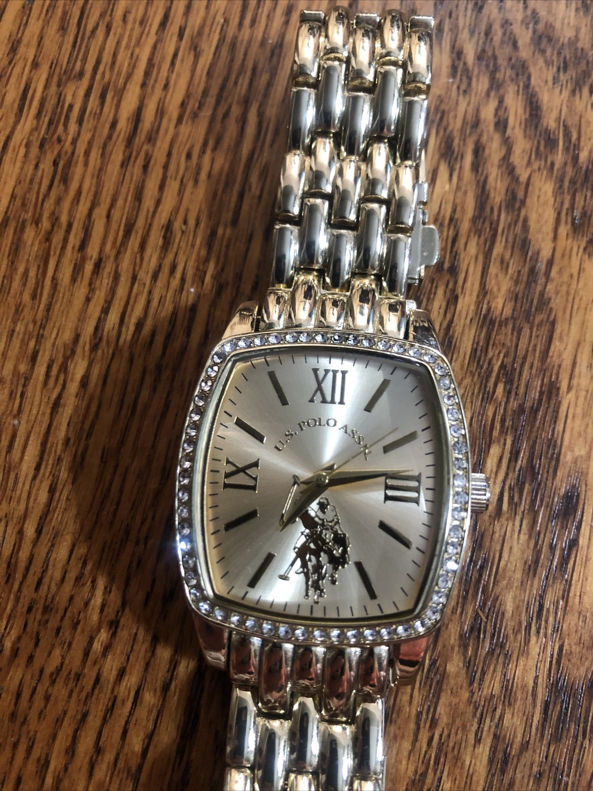 U.S. Polo Assn Gold Watch With Rhinestones 1.25” X 1.25” Frame Needs Battery