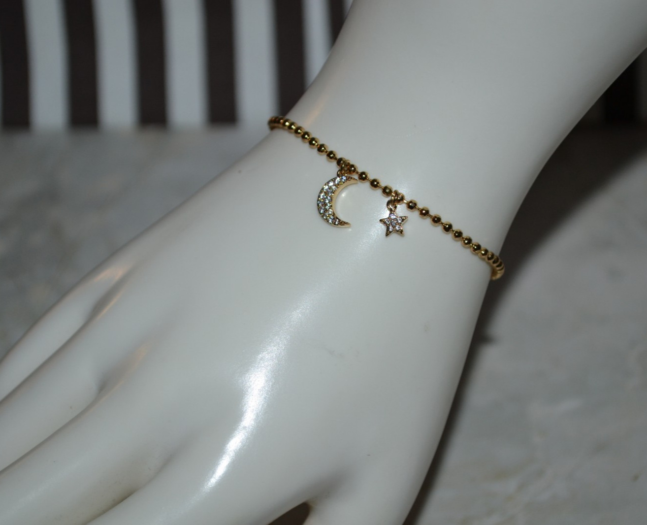 Henri Bendel Chain Bracelet with Star and Moon Charm