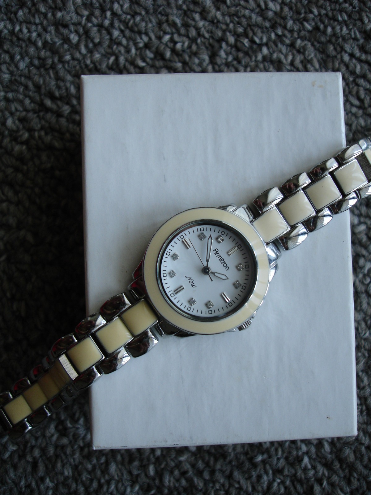 Pre-owned, women’s cream/silver Armitron Now watch ( Y121E/3); box, new battery