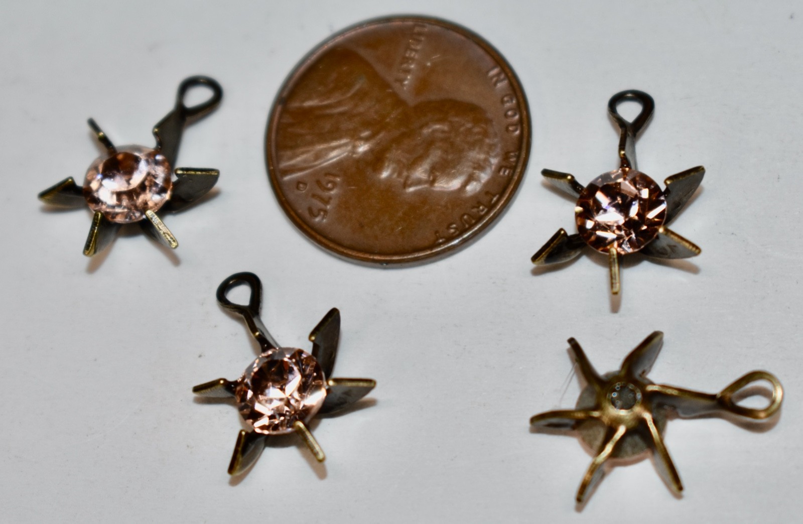VINTAGE 4 LIGHT ROSE RHINESTONES IN BRASS OX STAR SETTINGS made with Swarovski
