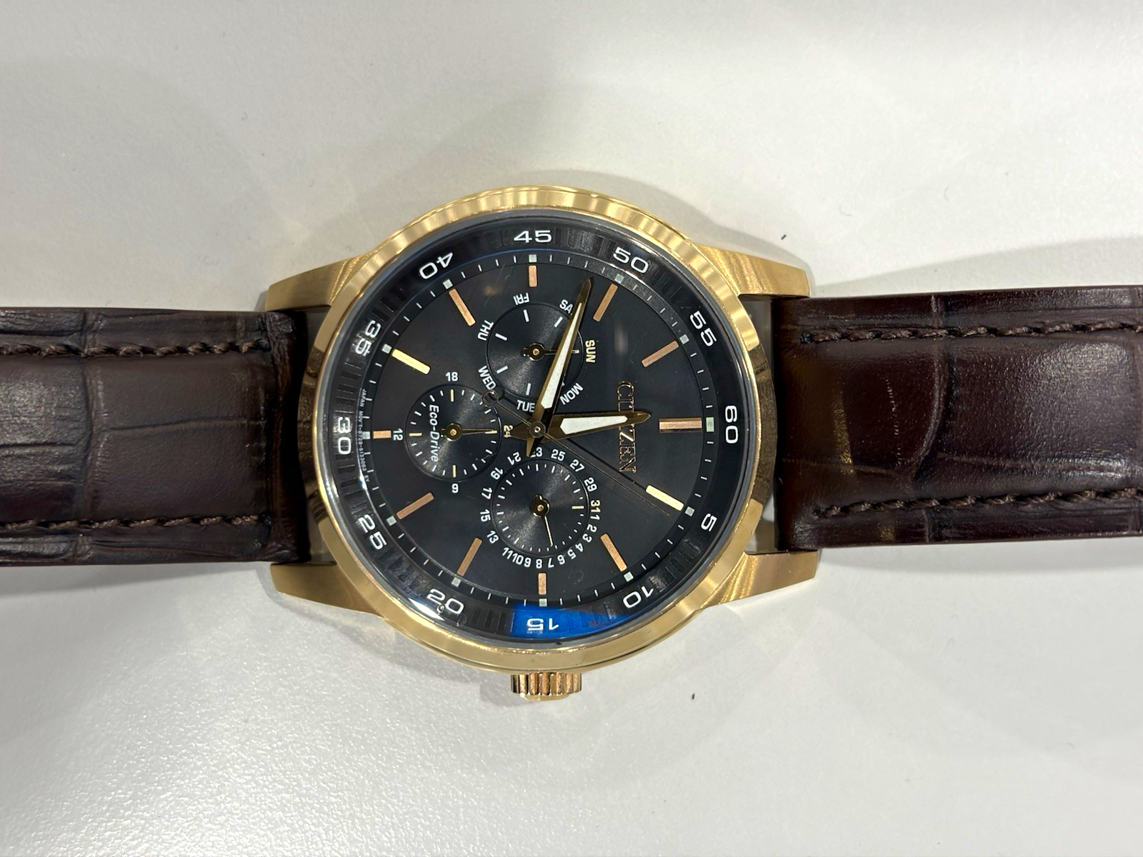 Citizen Eco-Drive Corso Mens Gold Tone Black Dial Brown Leather Strap Day Date