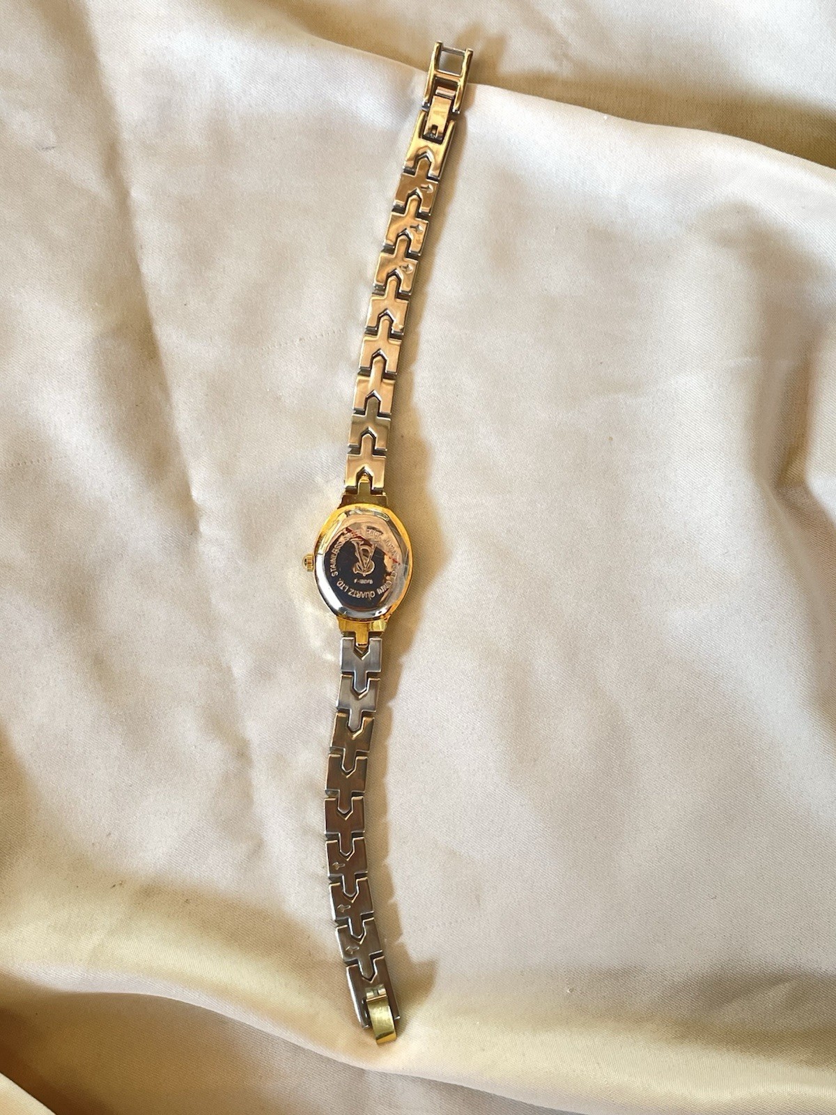 Vintage Sergio Valente Women’s Oval Quartz Analog Wristwatch Two-Tone Gold Dial