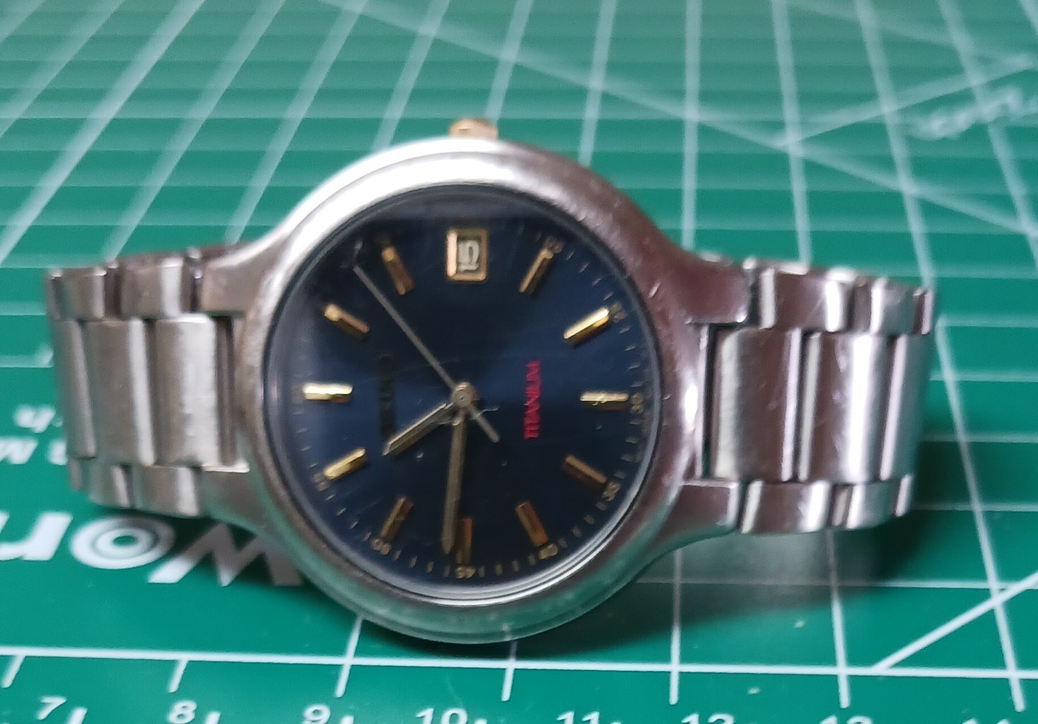 vintage Seiko Titanium quartz watch blue dial with gold hands & markers