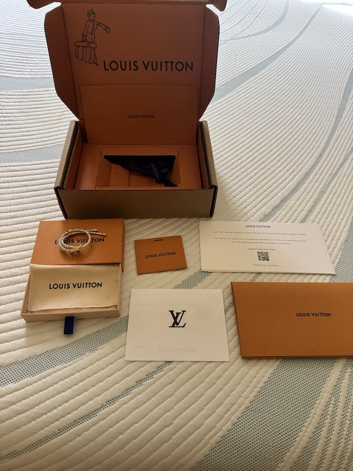 Louis Vuitton Signed Bloom White Wrap Bracelet w/ LV Charm, Drawstring, Sizable
