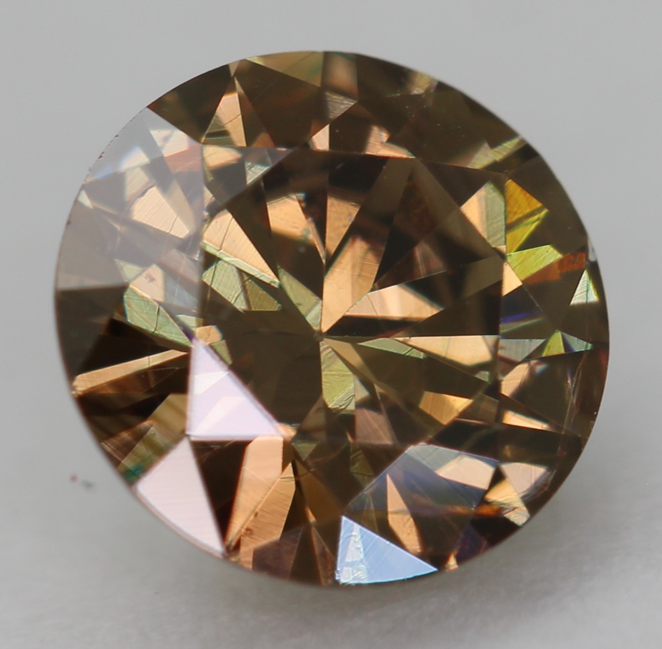 0.59 Ct Yellow Brown VVS2 Round Brilliant Natural Enhanced Diamond 5.74mm VIDEO
