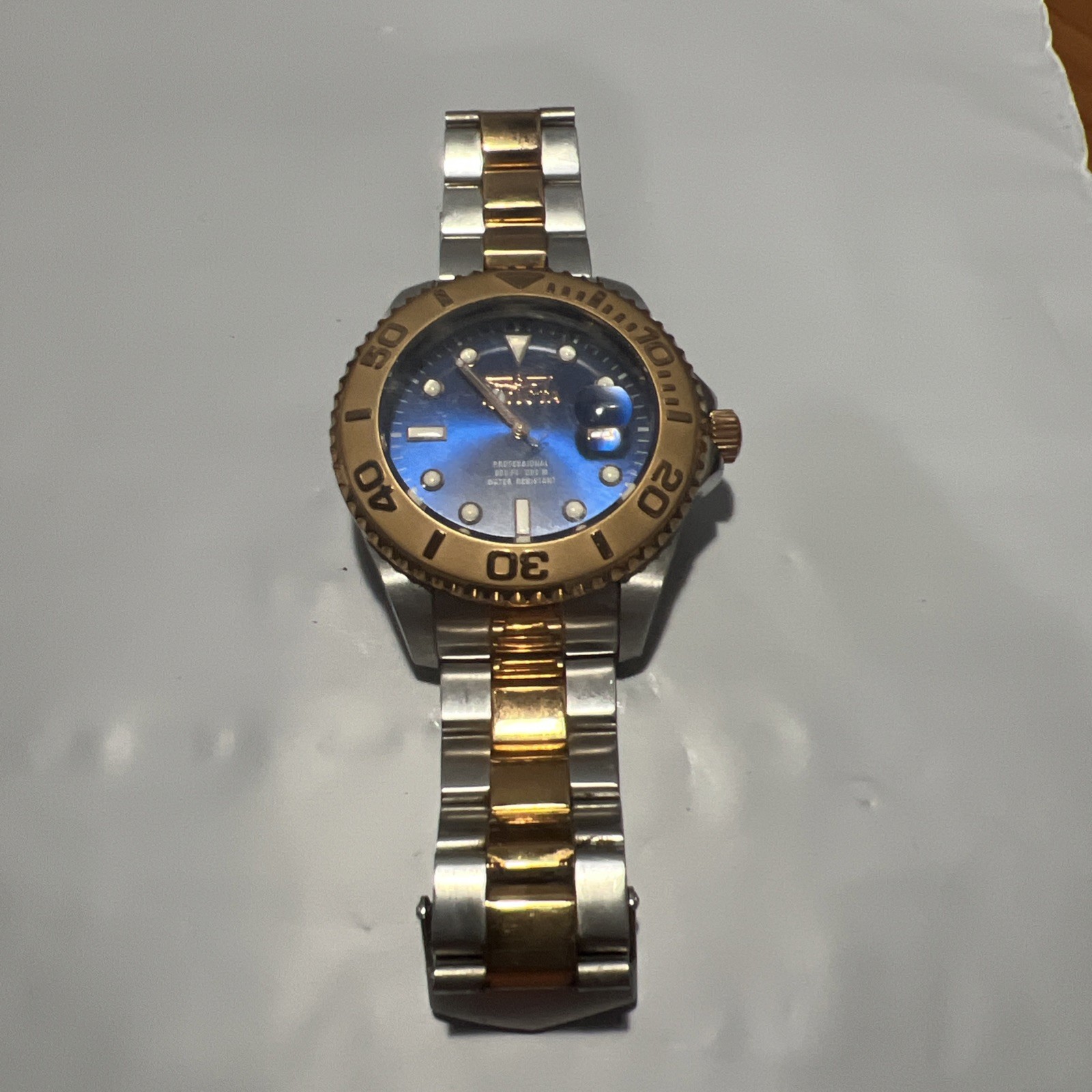 Invicta Men’s Watch Pro Diver Quartz Blue Dial Gold Bezel Two Tone Bracelet