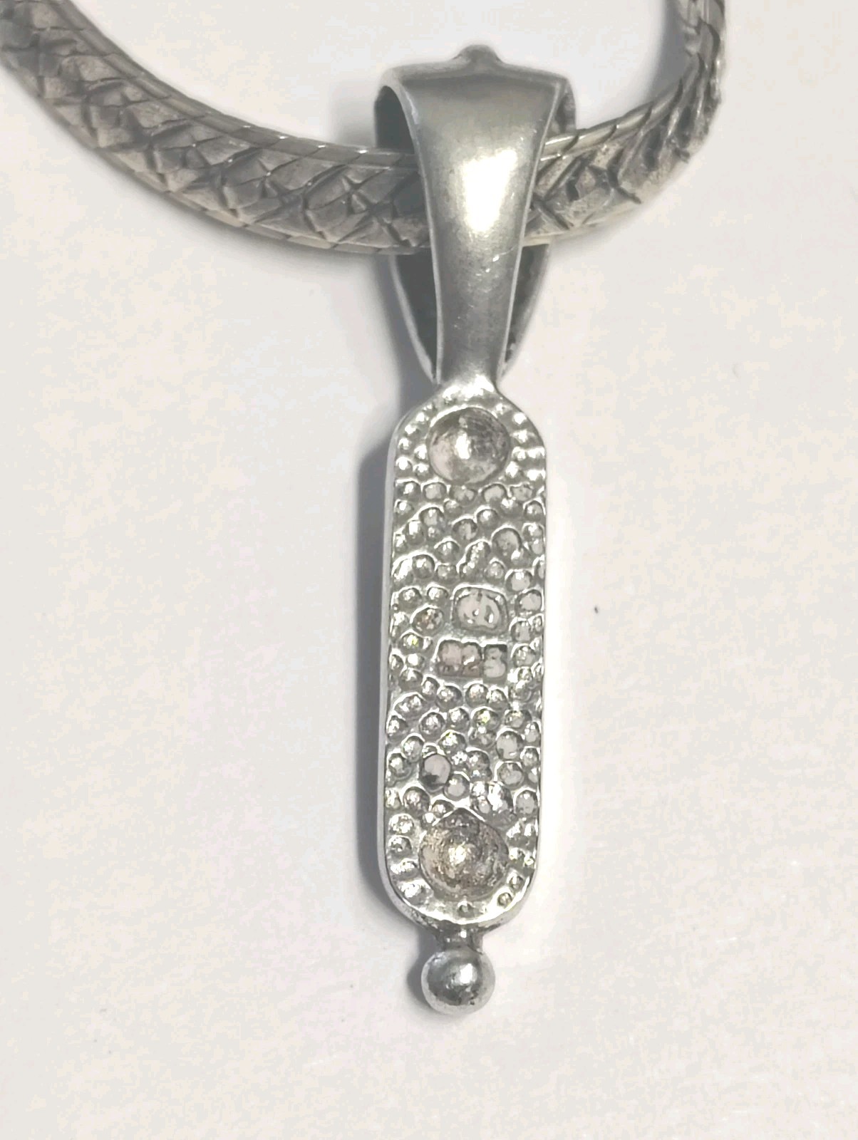 Korite Ammolite In Silver On 5 mm 16″ Sterling Silver Herringbone Chain