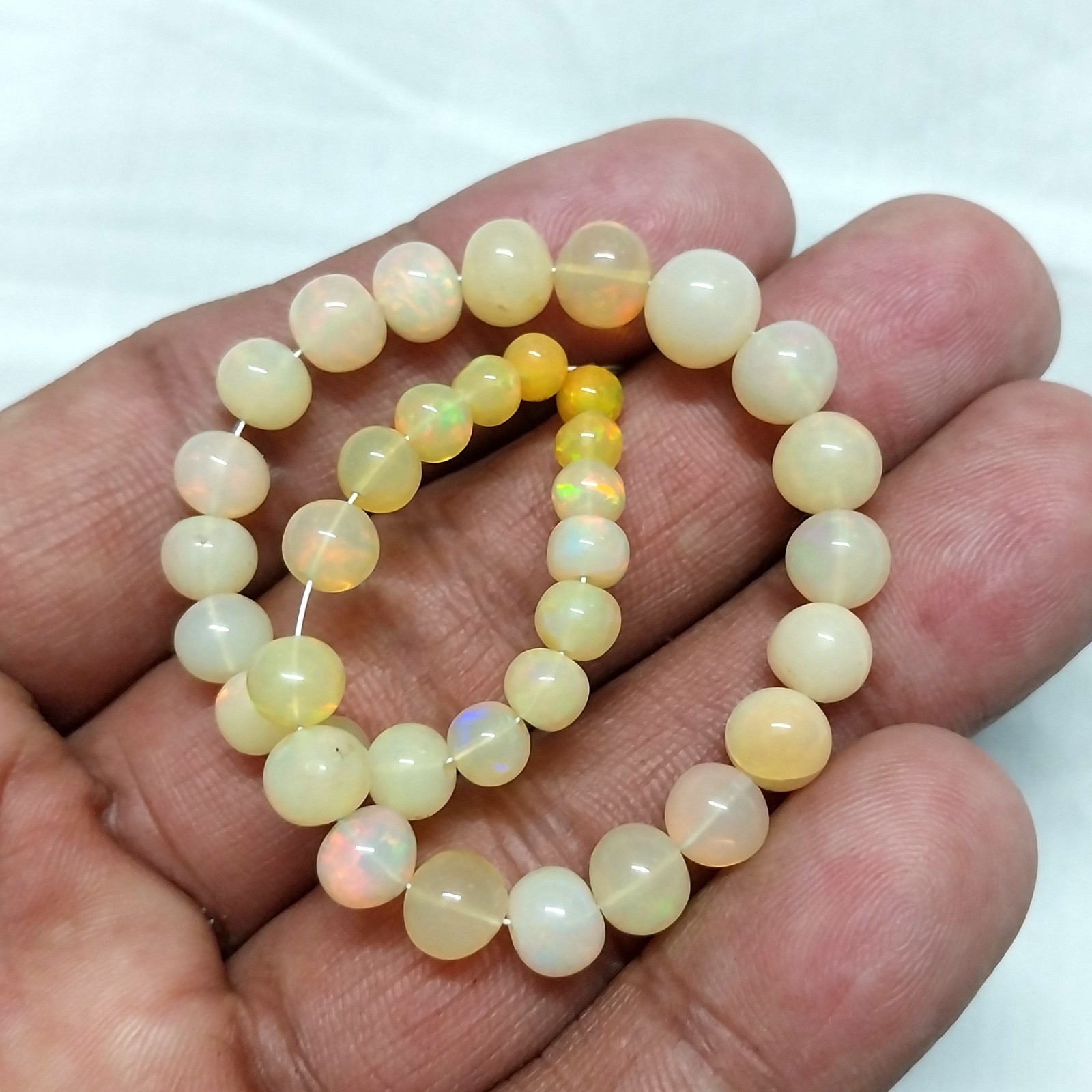 33 Carat 4.5 to 8 MM Natural Smooth Ethiopian Opal Ball Shape 8 inch Beads