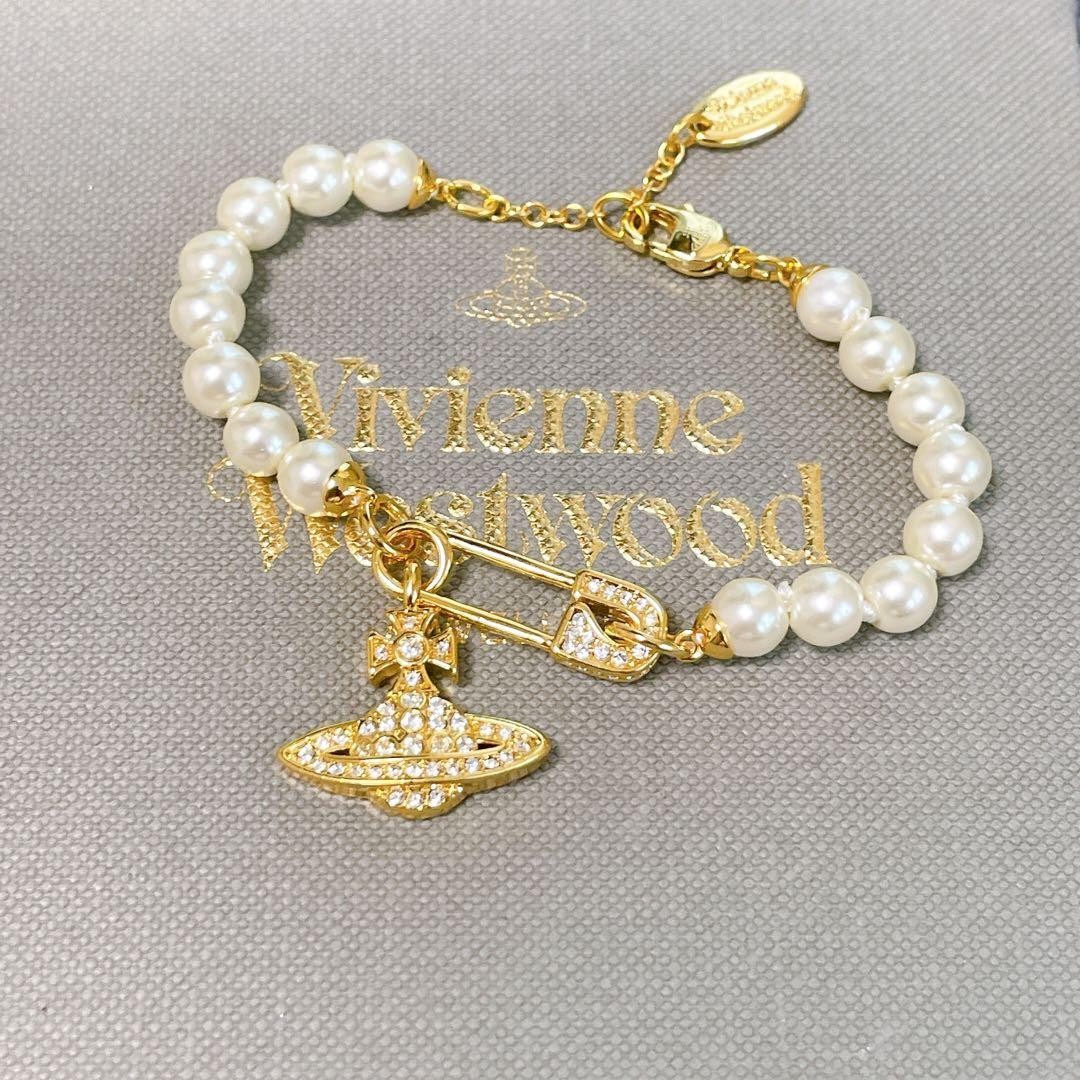 Vivienne Bracelet Mini Bas Relief Pearl Clip Orb Gold w/Pouch IN BOX