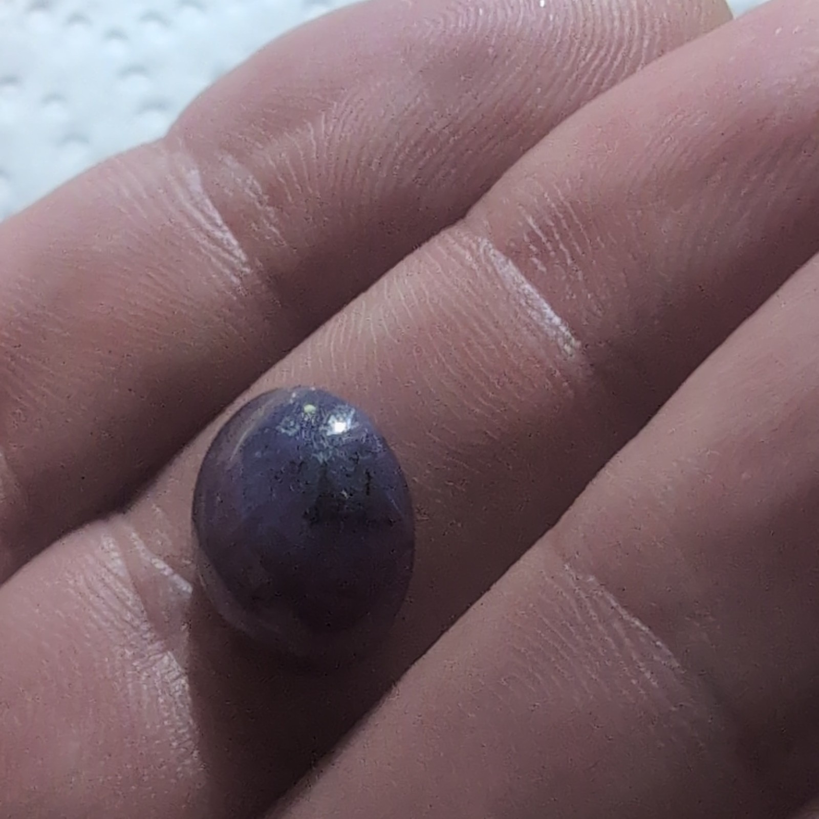Purple Star Sapphire Found In Franklin N.C. 9.5 Carat Glows Under Blacklight.
