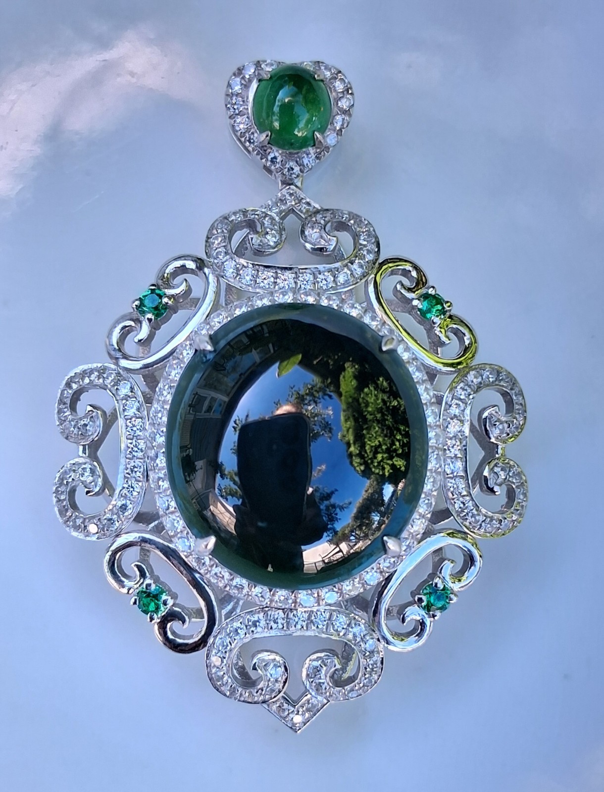 Silver Tone Ornate Scrollwork Oval Pendant Green Oval Cabochon & Accents