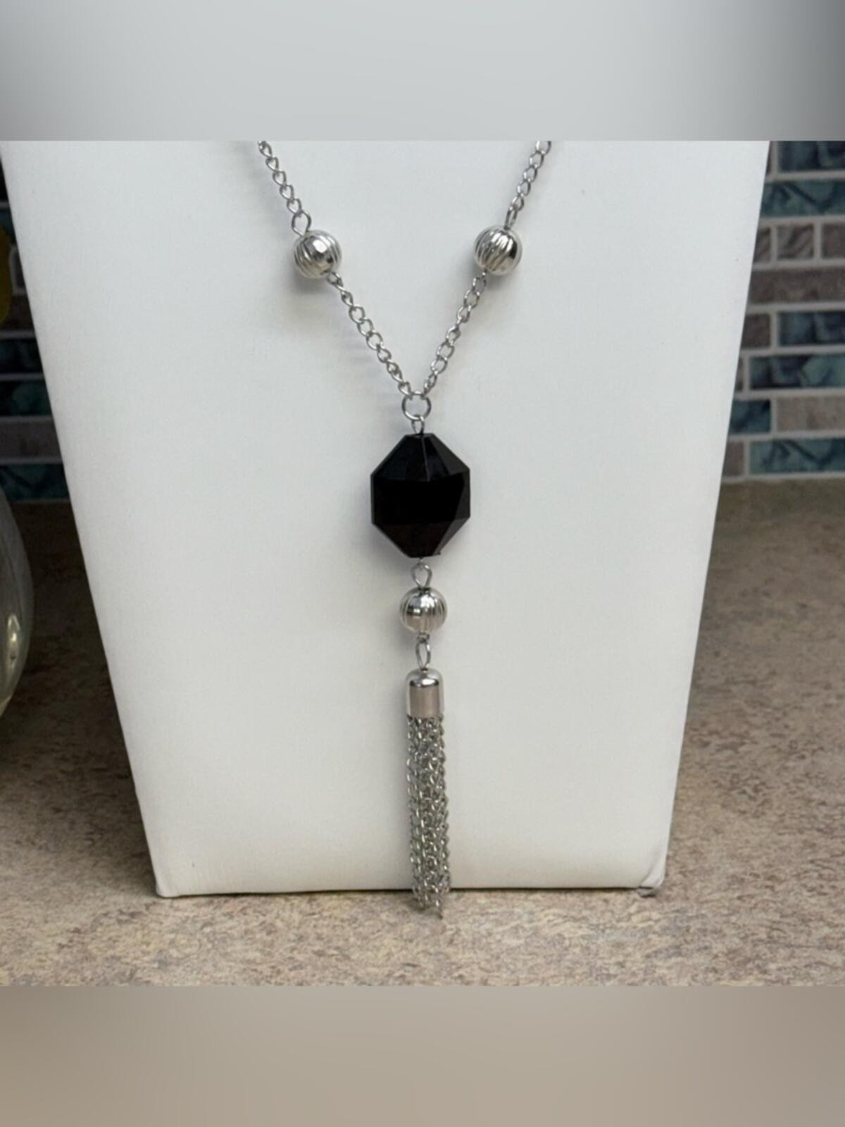 Silver and black y-style tassel necklace