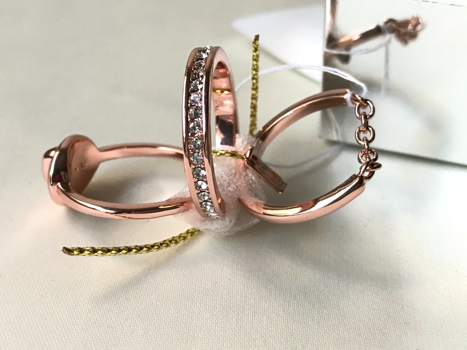 Coach pave turn-lock ring set