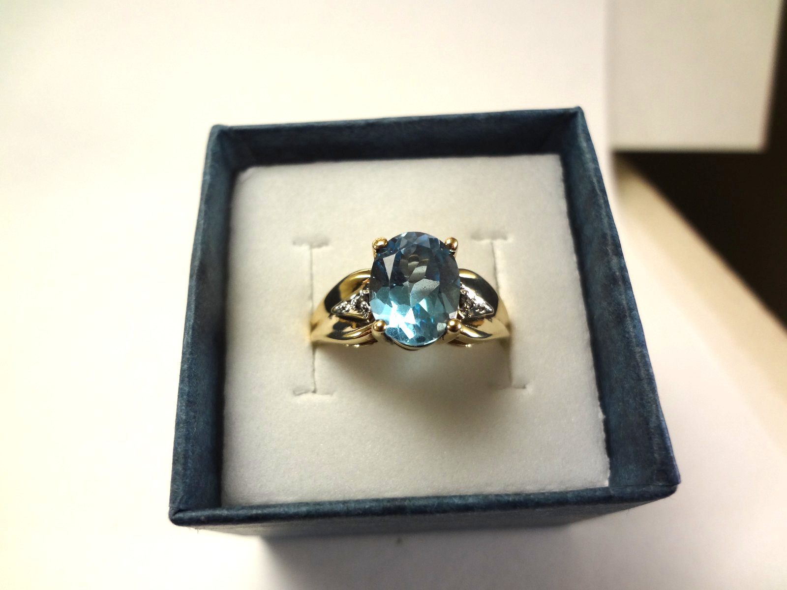10K SOLID GOLD – SWISS BLUE TOPAZ AND DIAMOND RING – 3.10 GRAMS – SIZE 7.0 – F95