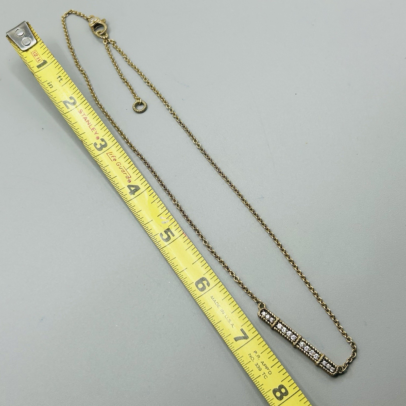 Judith Ripka Sterling Silver (gold color) Bar Necklace w 14 CZs +3 More on Clasp