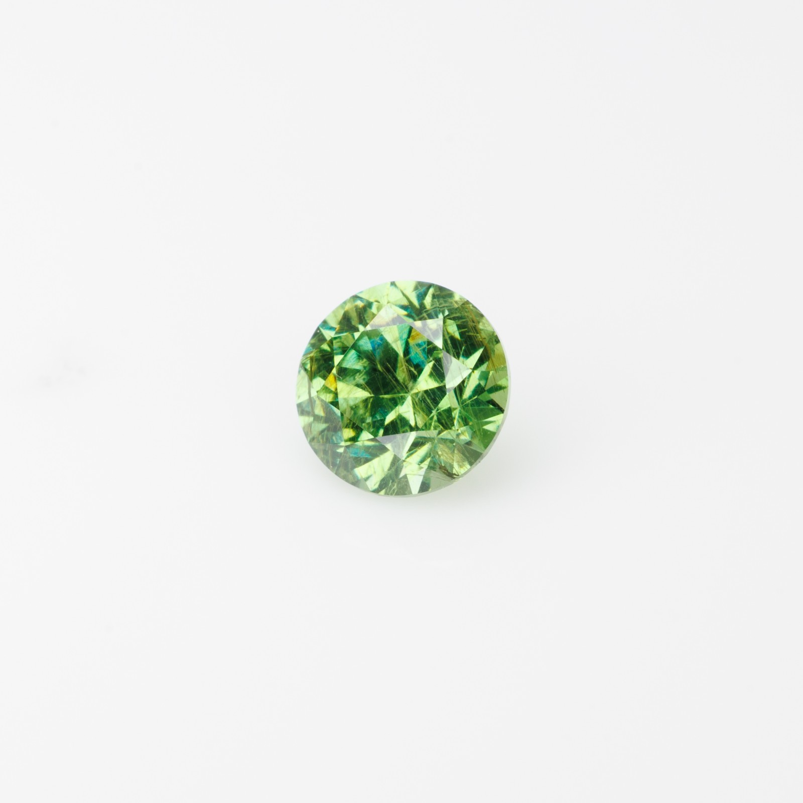 0.57 ct, Faceted Russian demantoid garnet