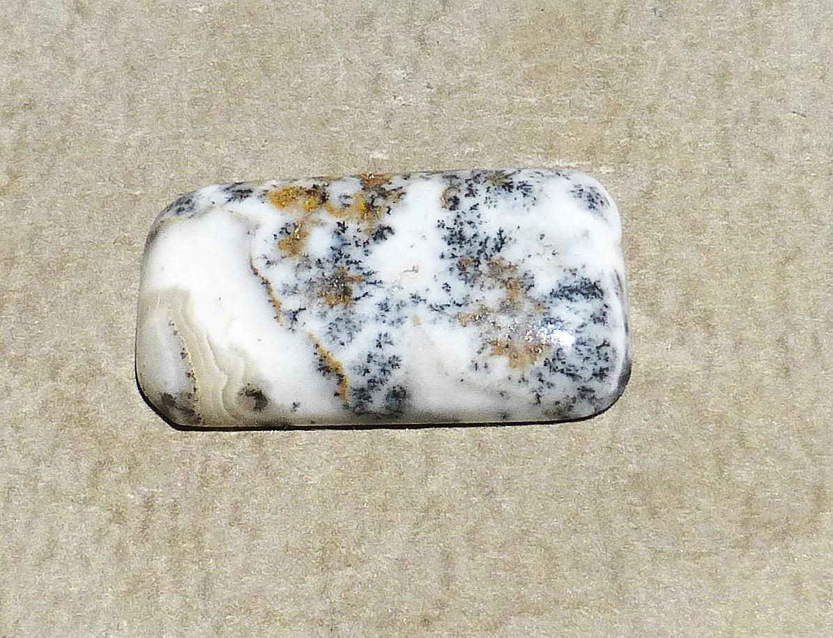 NATURAL manganese dendrites in calcite cabochon from California (36.40 cts.)