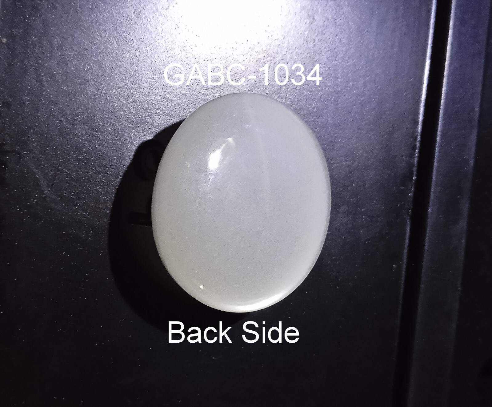 31 Carat 22.3×18.8×10.4 MM White Color Moonstone Oval Shape Cabochon Gemstone
