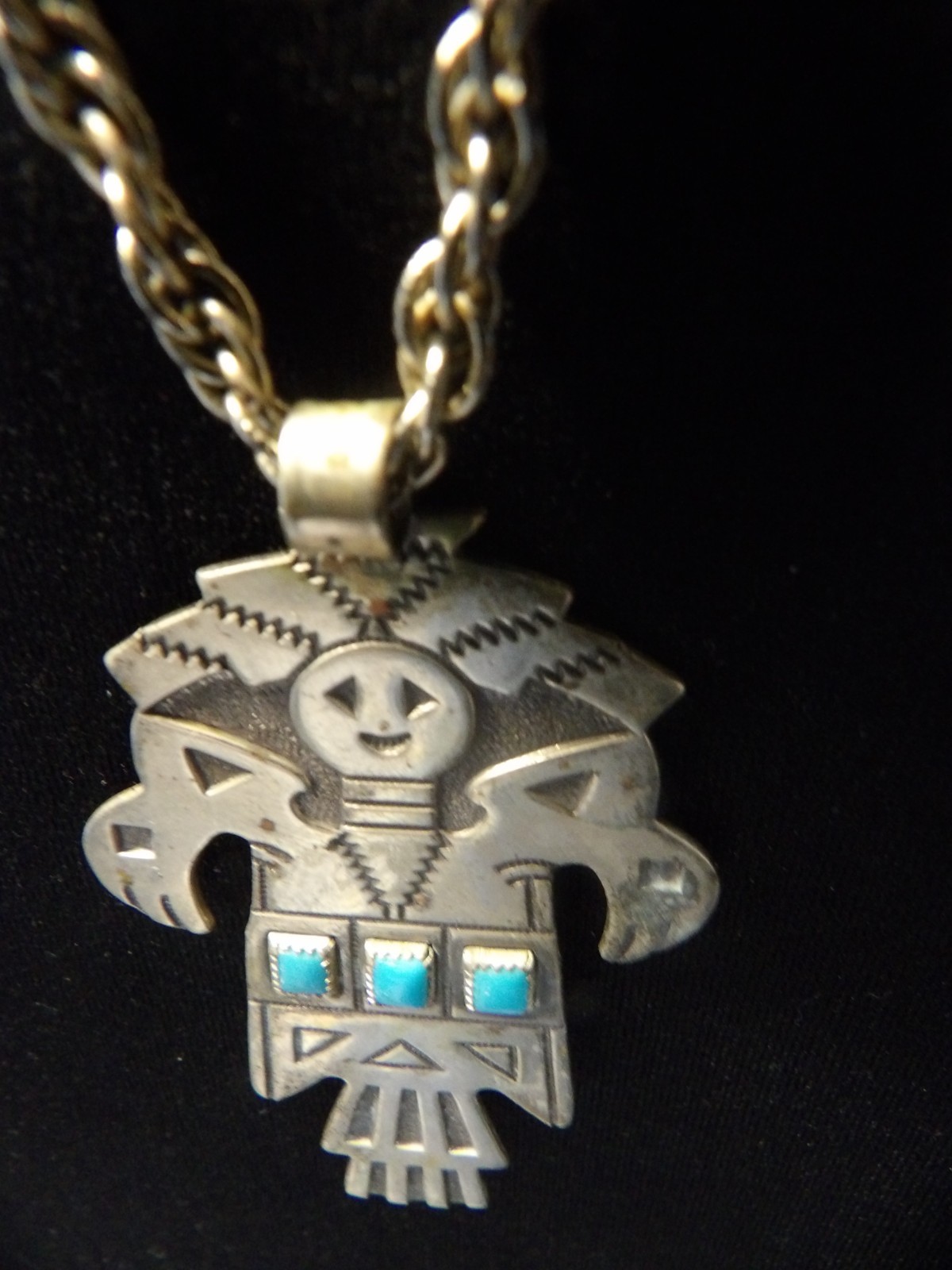 Navajo Kachina Totem Turquoise BRanded Nickle Silver Bell w/28″ Braided Chain.