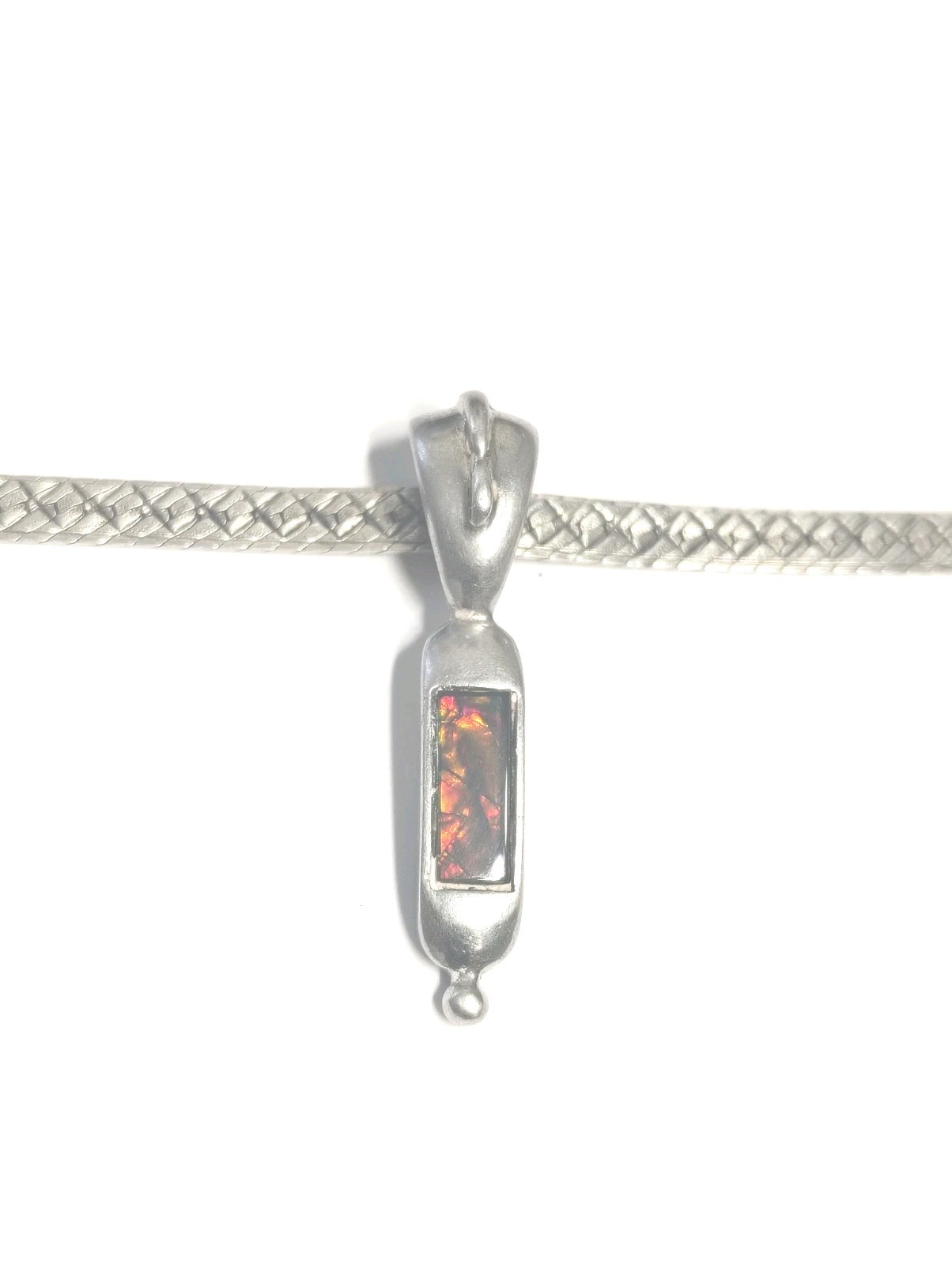 Korite Ammolite In Silver On 5 mm 16″ Sterling Silver Herringbone Chain