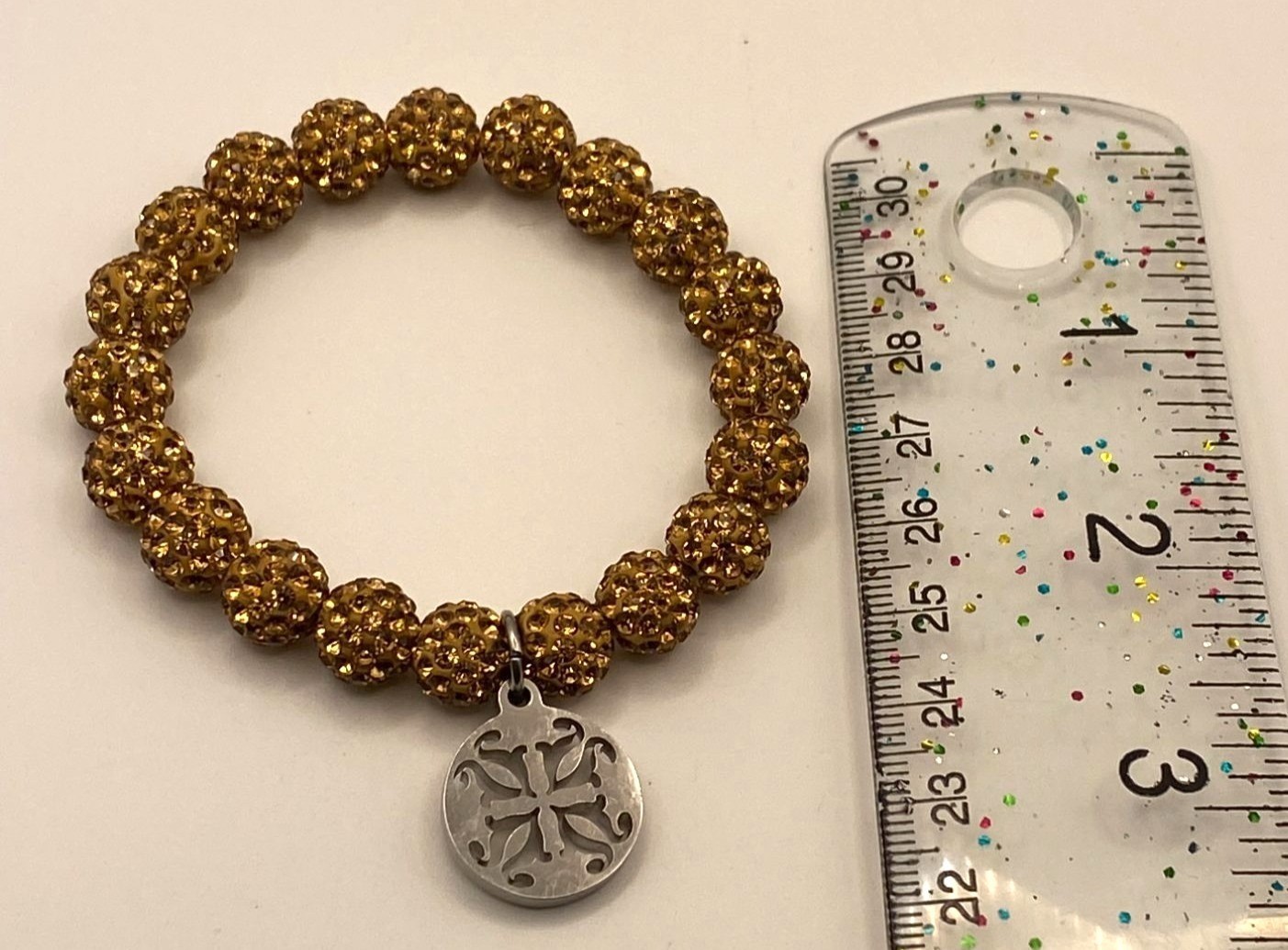 Rusted Cuff Gold Beaded Stretch Bracelet With Silver Charm Pendant