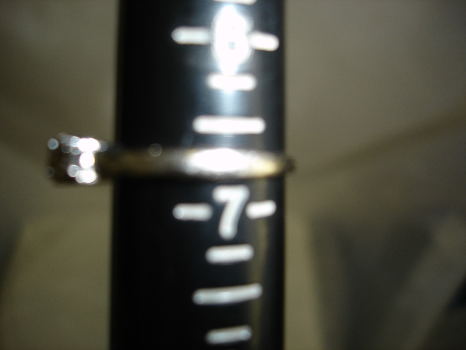 1OK WHITE GOLD AND .5 CTW 3 DIAMOND RING IN SIZE 6.75