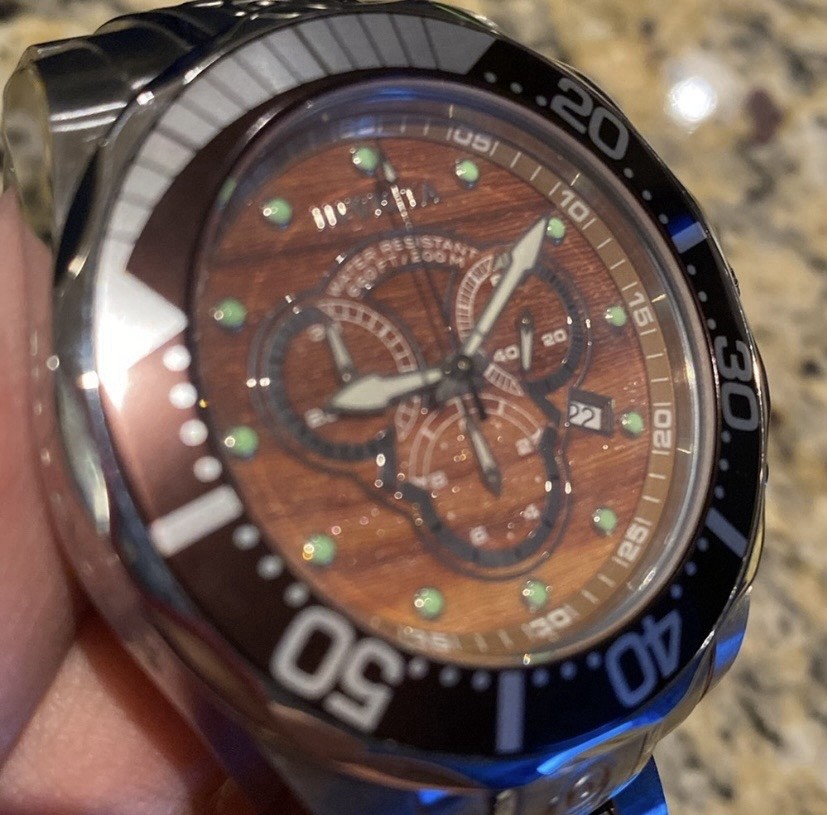 Invicta Pro Diver men’s quartz watch with a wood grain dial model 0164.