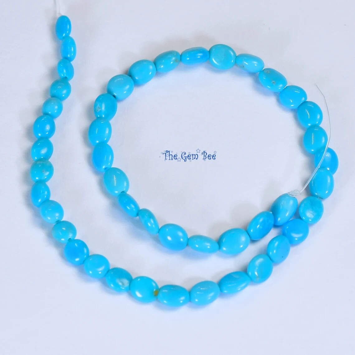 4mm Sleeping Beauty Turquoise Smooth Freeform Nuggets 8 inch strand