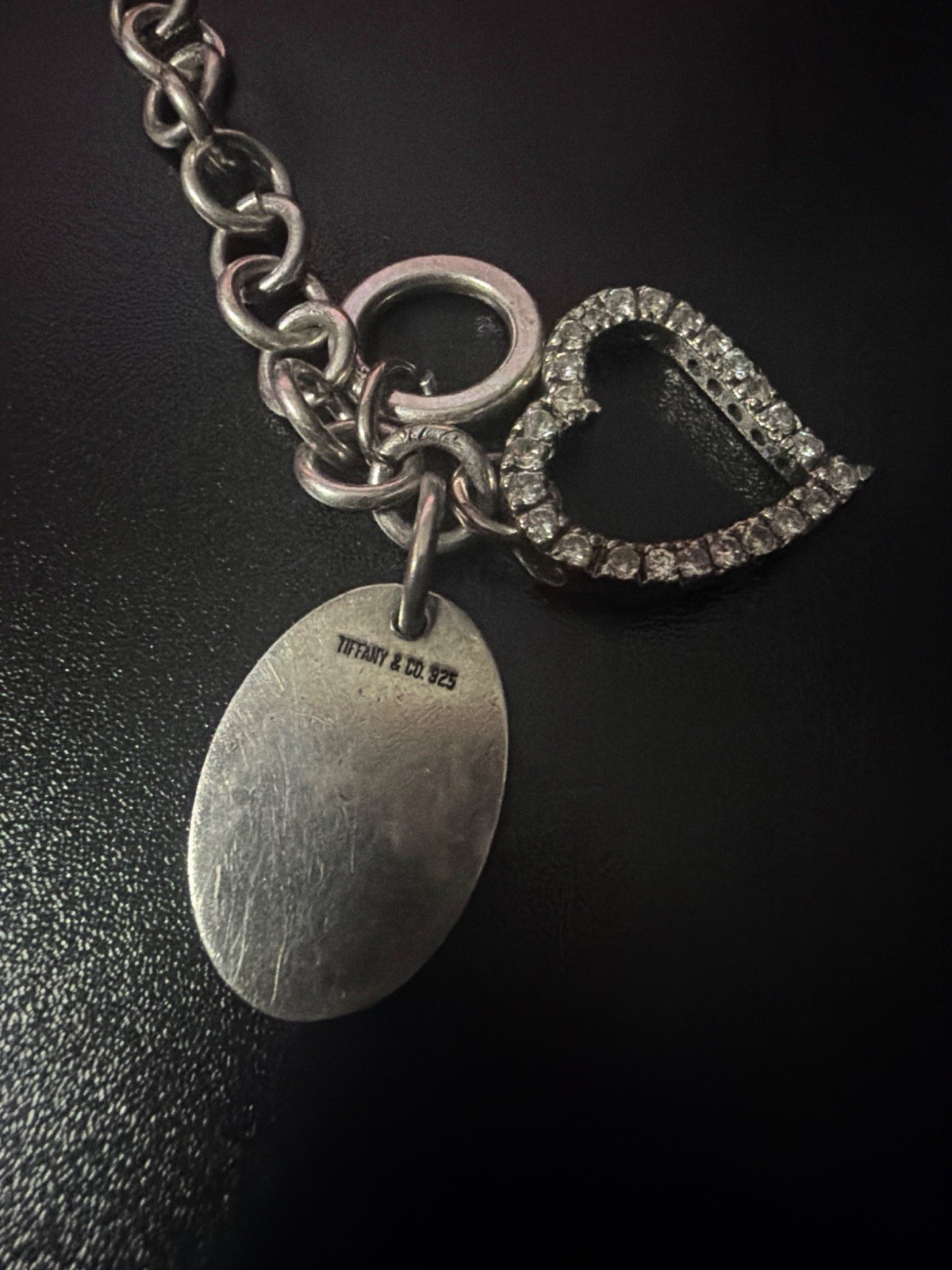 Tiffany & Co. 925 Sterling Silver Diamond Heart Necklace. Approximately 15in
