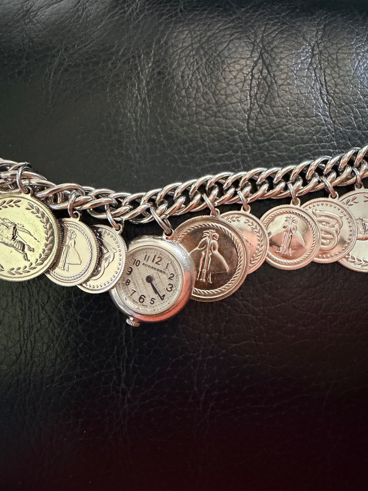 Authentic Swiss Made Burberry Lady Sterling Silver 10Charm Bracelet Watch BU5220