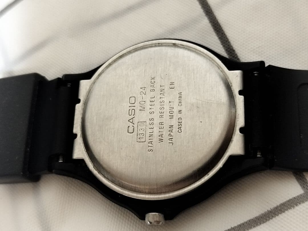 Excellent condition, fully functional CASIO MQ-24 analog black wristwatch.