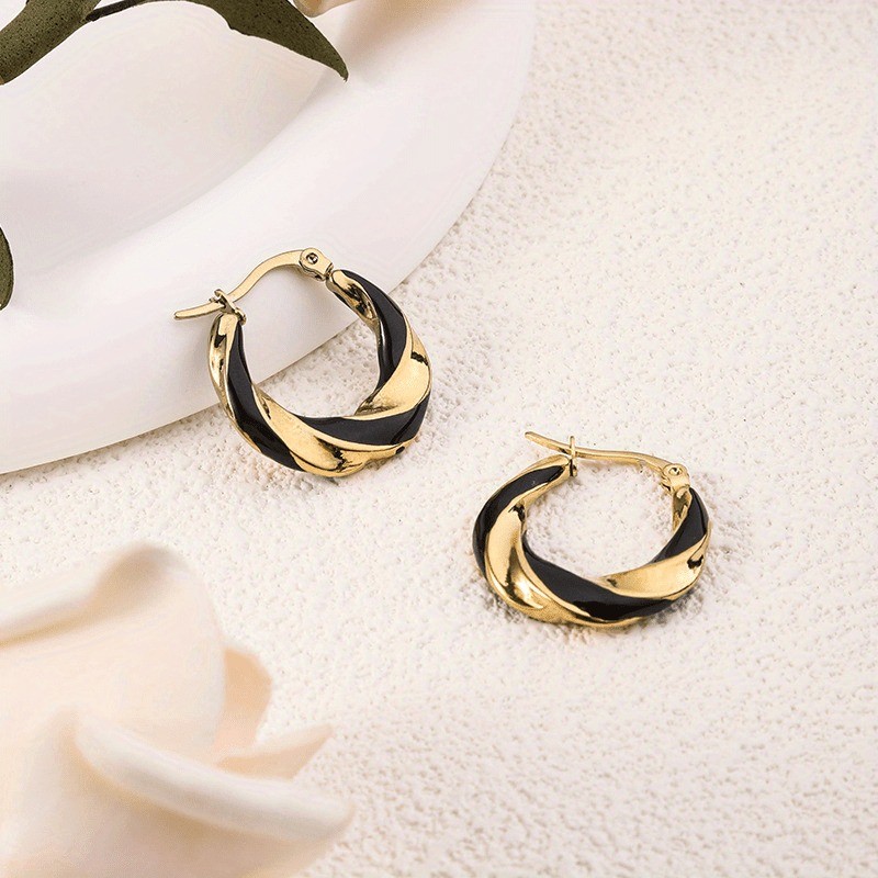 Bohemian Stainless Steel Drip Oil Earrings Women’s Irregular Twisted Ear Buckle