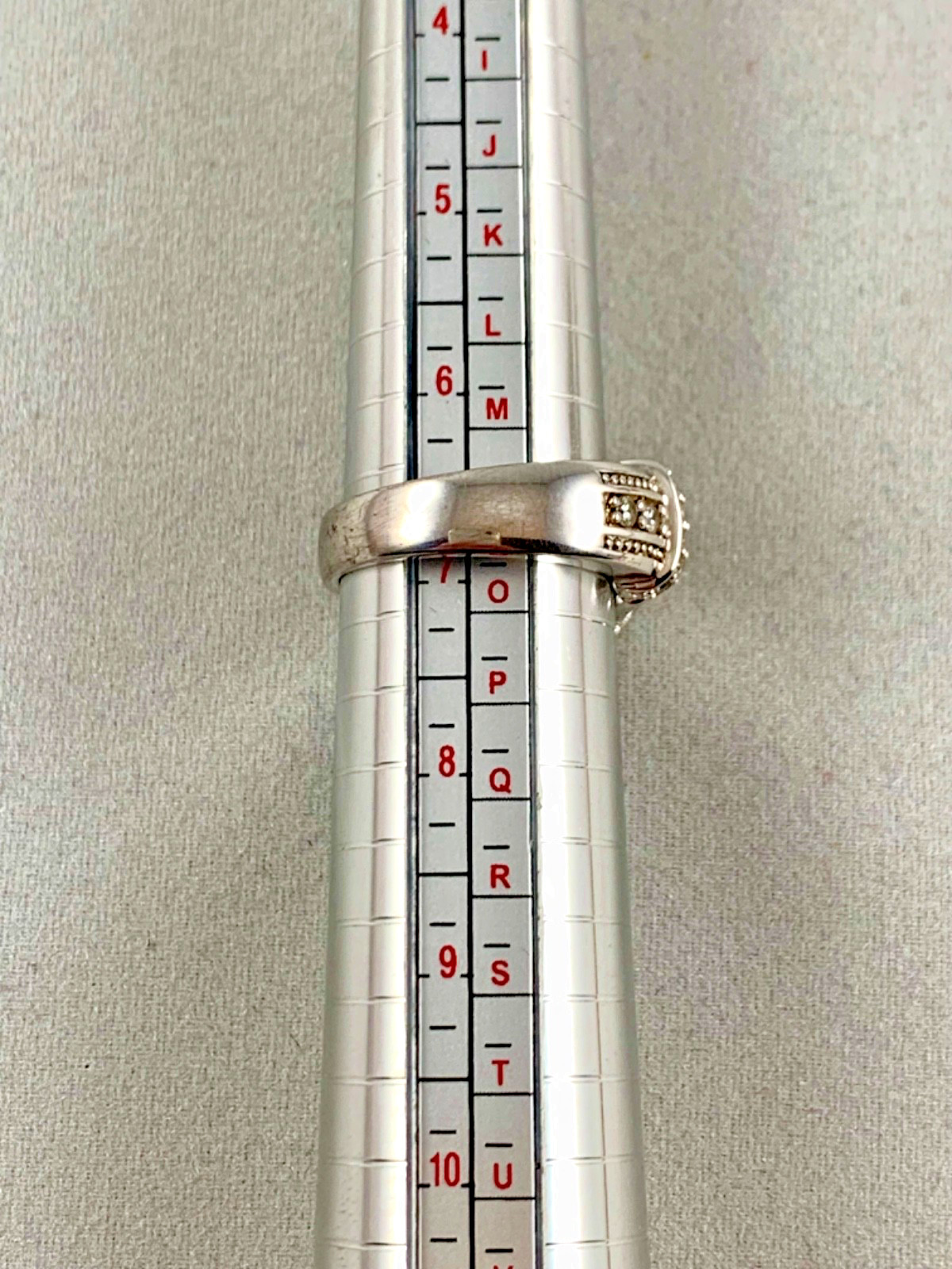 Victoria Wieck Solid Sterling CZ Buckle Ring Sz. 6.75”
