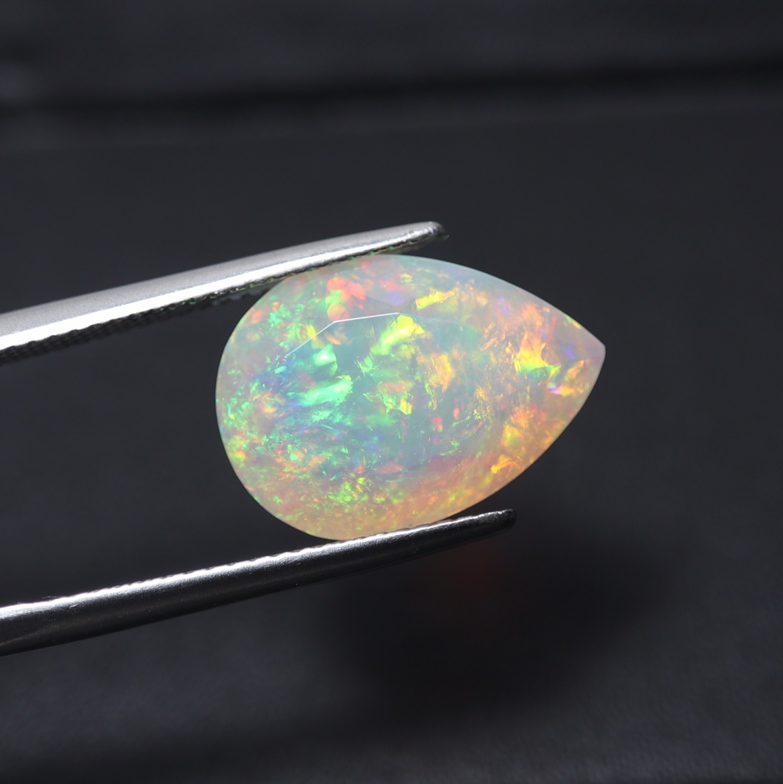 5.3Cts Real AAA Ethiopian Opal Green Red Fire Faceted Pear Gemstone 15.8×11.4MM